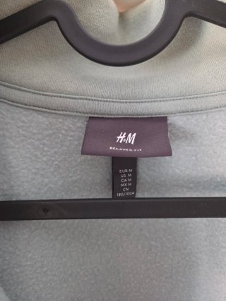 Sudadera verde con cremallera