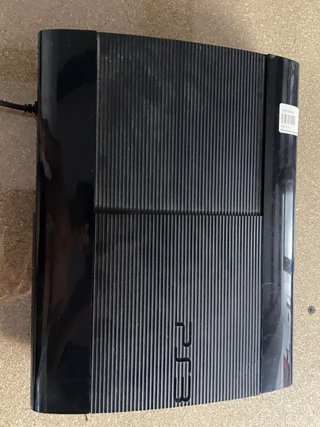 PS3 Super Slim + 2 mandos + 10 juegos