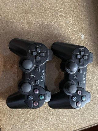 PS3 Super Slim + 2 mandos + 10 juegos