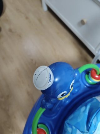 Saltador para bebé con juguetes