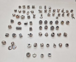 Lote Charms Pandora y Chamilla Plata 925