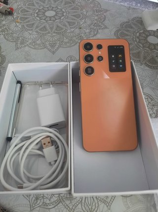 Teléfono móvil negro y otro naranja imitación chin