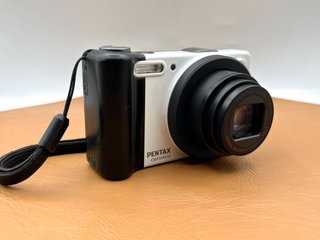 Pentax Optio RZ10 Cámara Digital + Accesorios