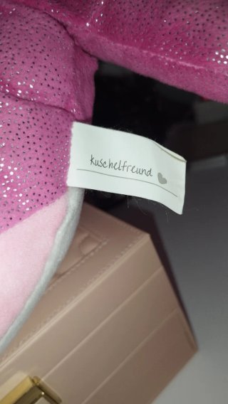 Peluche de delfín rosa brillante