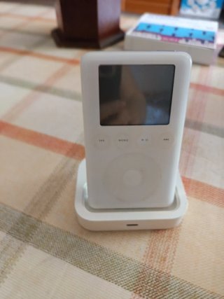 Base de carga iPod con salida de audio