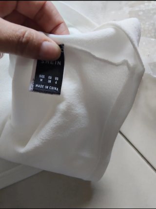Top bianco tulle con paillettes