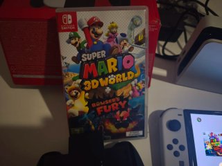 Nintendo Switch OLED con dos juegos
