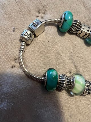 Pulsera Pandora charms turquesa y dados