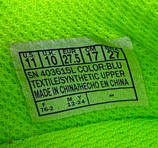 Zapatilla deportiva Skechers niño azul y verde.