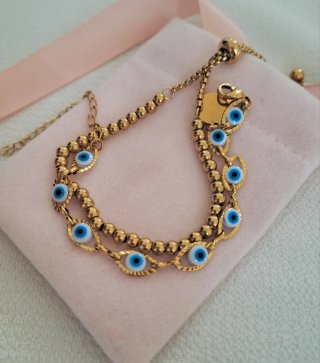Conjunto pulseras ojo Horus y bolitas doradas