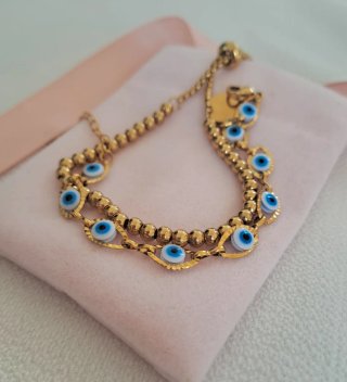Conjunto pulseras ojo Horus y bolitas doradas