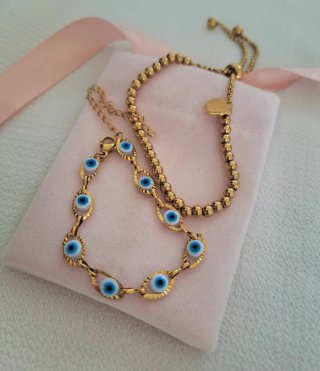 Conjunto pulseras ojo Horus y bolitas doradas
