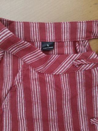 Camiseta sin mangas a rayas rojas y blancas