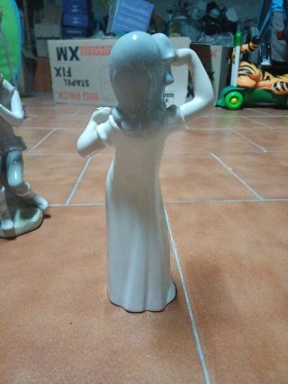 Figura de porcelana Rex niña