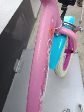 Bicicleta infantil rosa con ruedas de 12 pulgadas