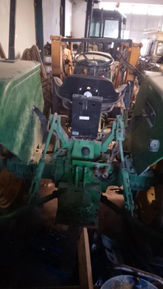 Tractor John Deere 2450 con pala