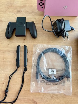 Nintendo Switch OLED Vinilo Rosa y Funda