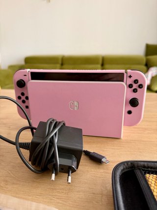 Nintendo Switch OLED Vinilo Rosa y Funda