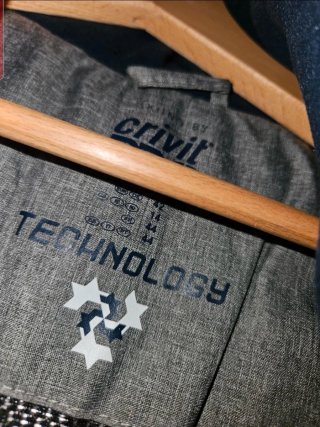 Chaqueta de nieve hombre gris y blanca