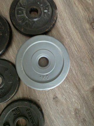 Banco de abdominales y pesas