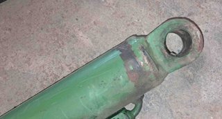 2 botellas hidraulicas pala BMH John Deere 4420.