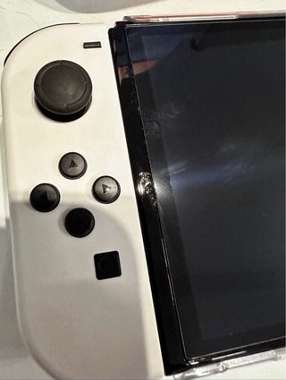 Nintendo Switch OLED Blanca y Roja