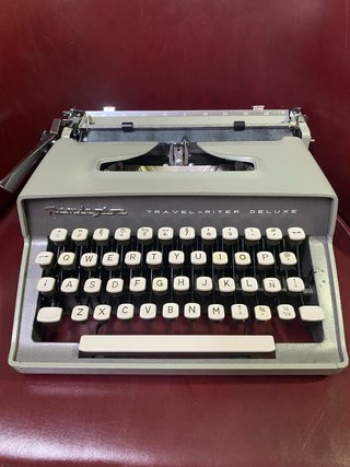 Máquina de escribir Remington Travel-Riter Deluxe