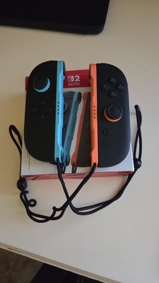 Pareja Joy-Con Nintendo Switch Azul y Naranja