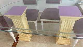 Mesa de comedor de cristal ovalada