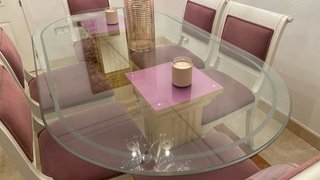 Mesa de comedor de cristal ovalada