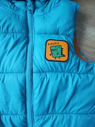 Chaleco acolchado infantil dinosaurio