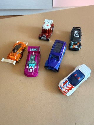 Hot Wheels City T-Rex Challenge con 6 coches