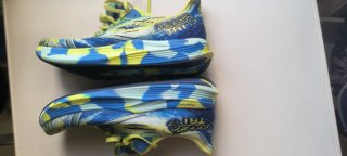 Zapatillas ASICS  noosa 15 Azul y Amarillo.