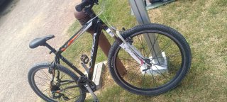 Bicicleta Orbea MTB Negra y Naranja en sanguli