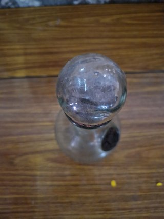 Porrón de vidrio con tapón de corcho
