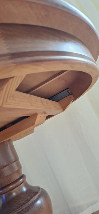 Mesa de comedor redonda de madera