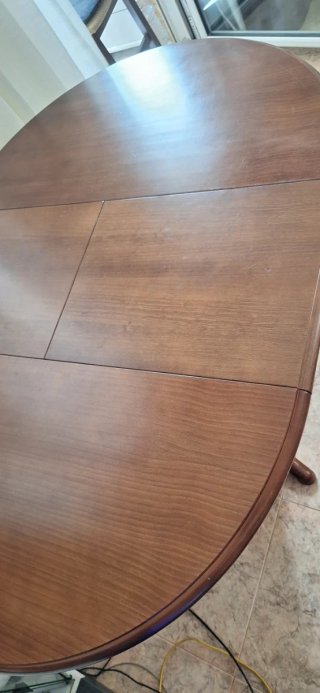 Mesa de comedor redonda de madera