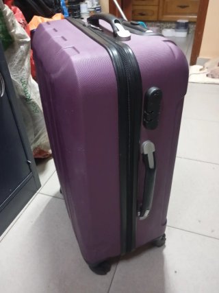 Maleta de viaje morada