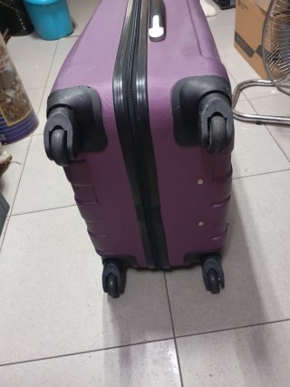Maleta de viaje morada