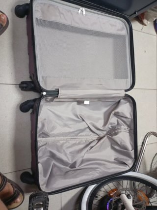 Maleta de viaje morada