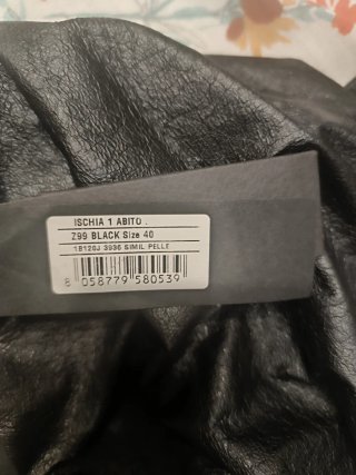Vestito nero monospalla con fiocco