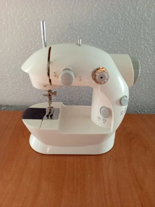 Mini Máquina de Coser Eléctrica