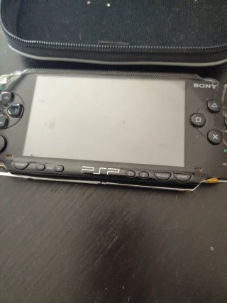 Funda y juegos PSP Sony