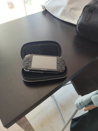Funda y juegos PSP Sony