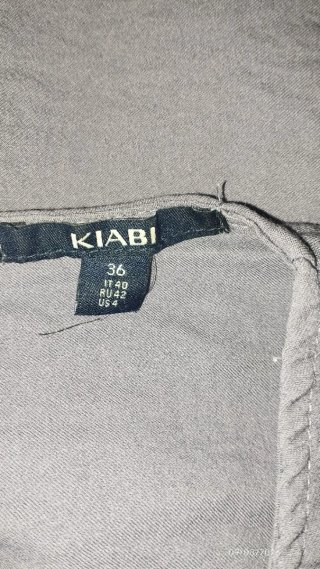 Mono corto Kiabi malva talla 36