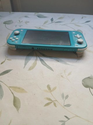 Nintendo Switch Lite Azul - Para Piezas o reparar