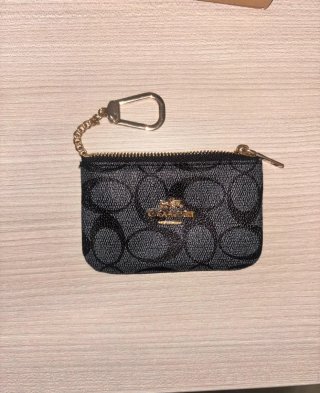 Monedero Coach