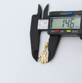 Colgante de oro de 18k. Peso: 1.24 gr.