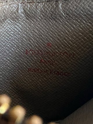 Pochette Louis Vuitton con catenella