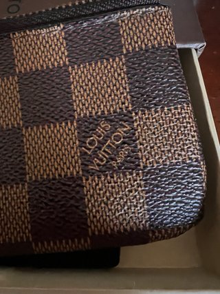 Pochette Louis Vuitton con catenella
